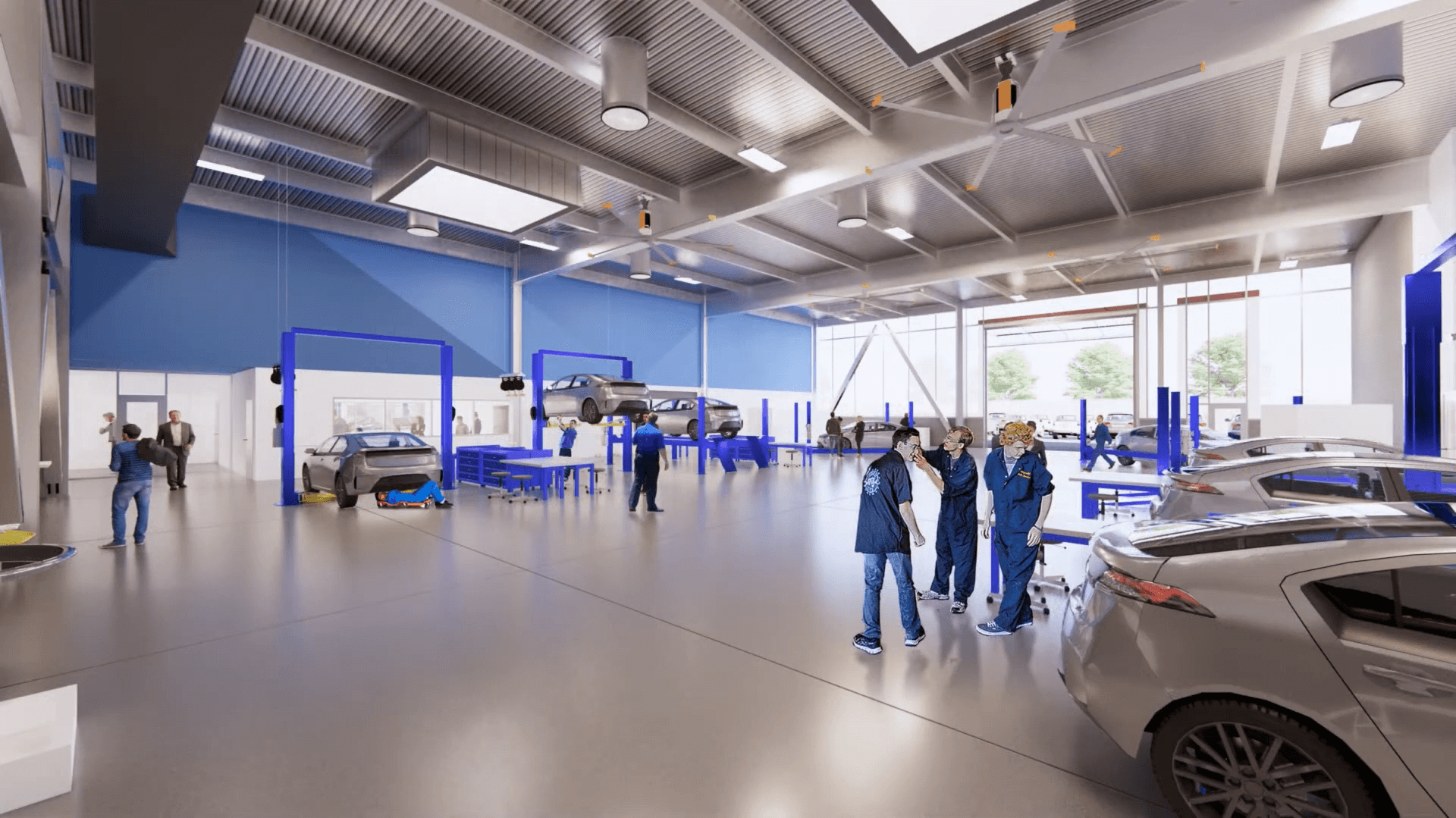 Students working in the autoshop and garage inside the Applied Technology Building