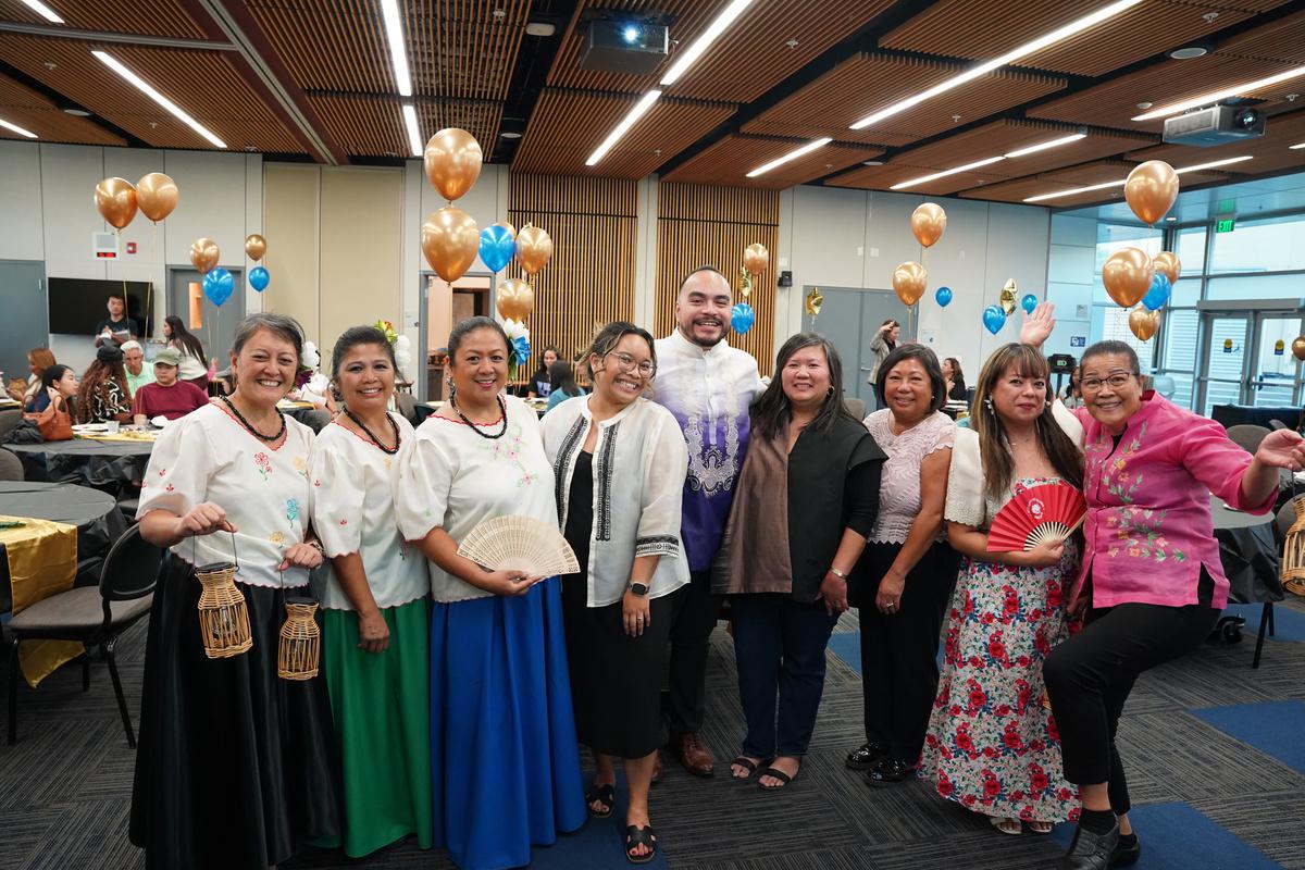 A group photo of Dr. Zarate with the performers for the FAHM event