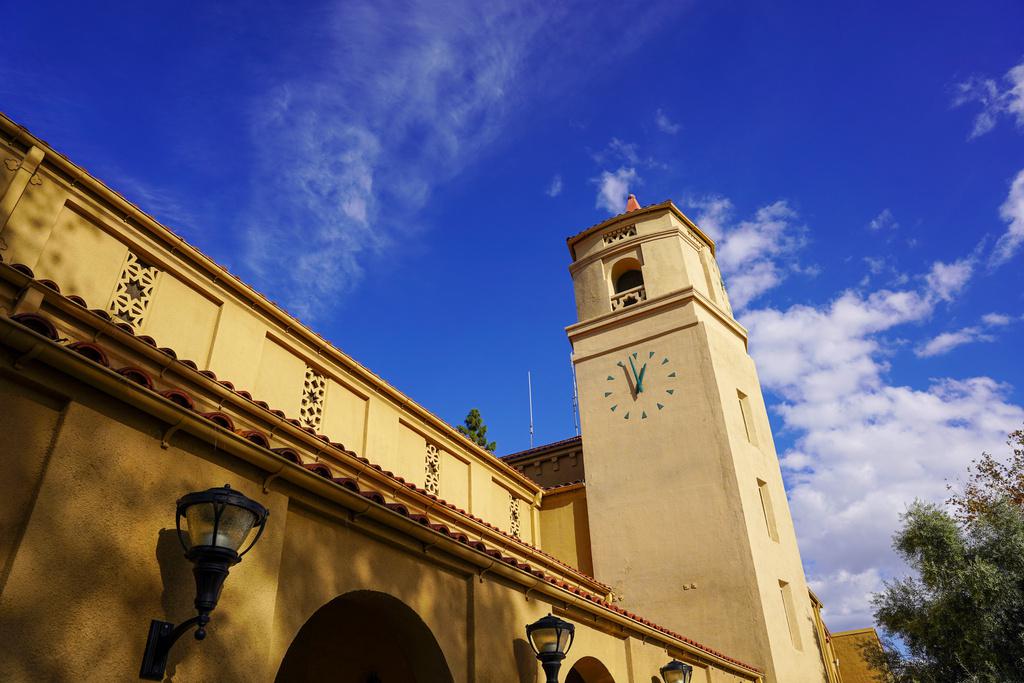 A low angle shot of the Auditorium and clock tower