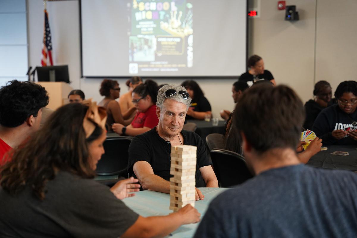 Students and faculty members playing Janga