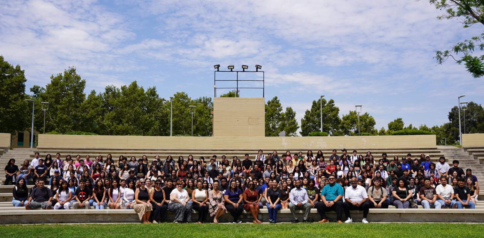 A large group shot of facilitators and students of Valley-Bound Commitment sitting at the Greek Theater