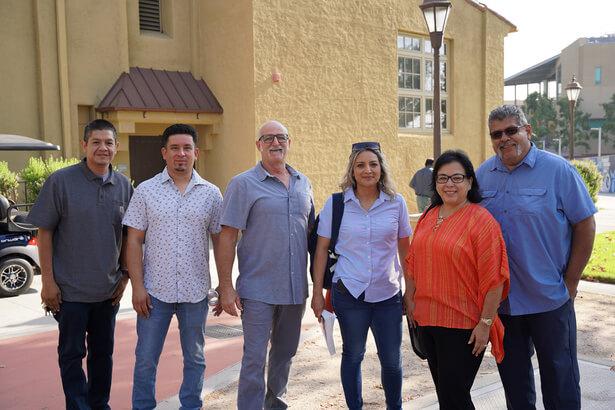 A group photo with chancellor Dr. Diana Z. Rodriguez